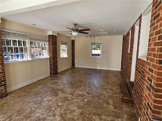 unfurnished room featuring ceiling fan