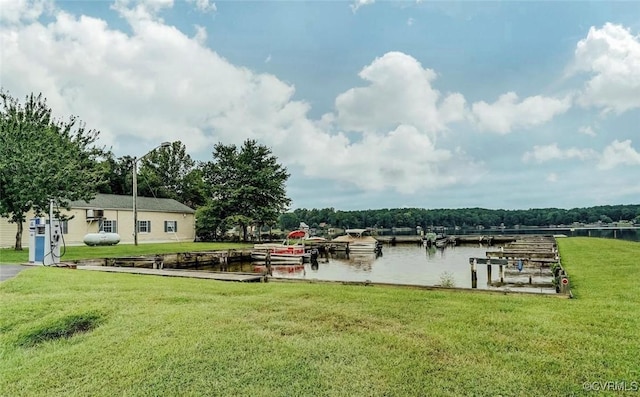 exterior space featuring a water view and a dock