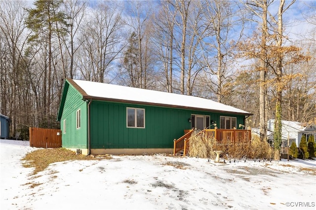 ranch-style house with a wooden deck