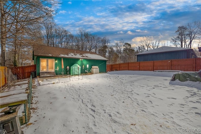 view of yard covered in snow