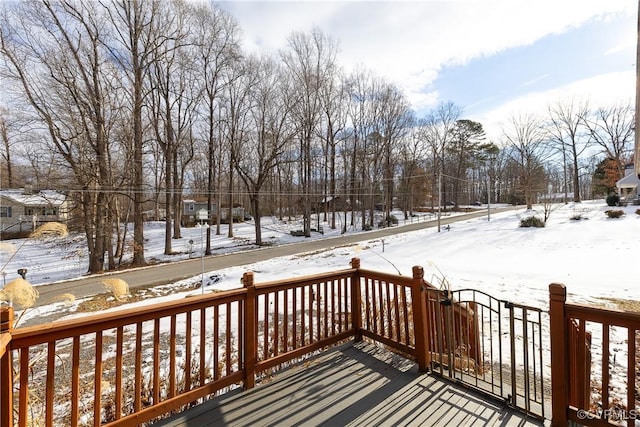 view of snow covered deck