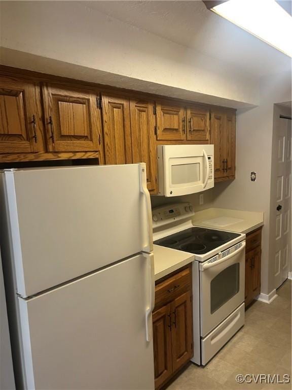 kitchen featuring white appliances