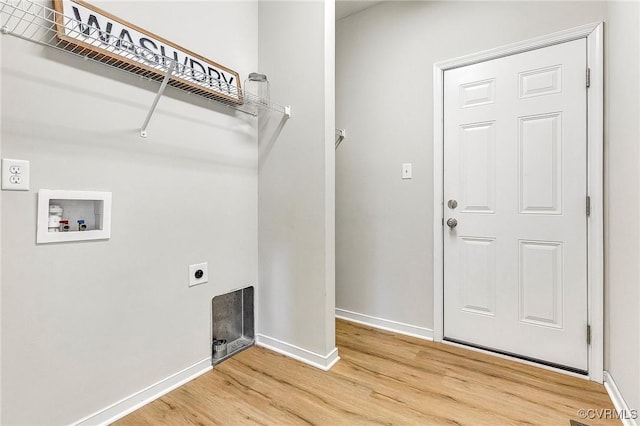 laundry area with hookup for a washing machine, hardwood / wood-style floors, and hookup for an electric dryer