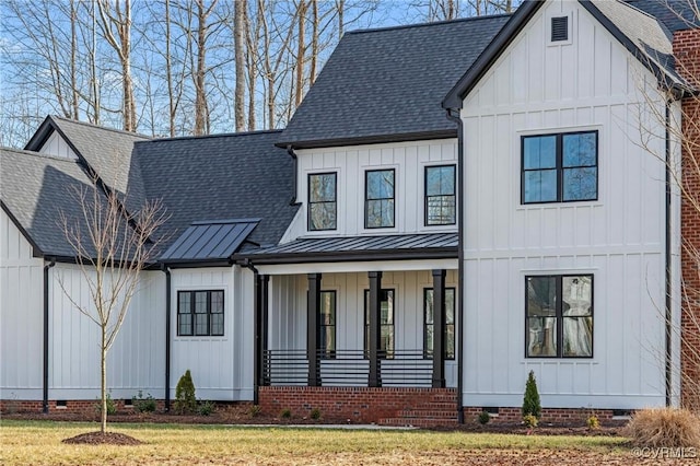 modern farmhouse with board and batten siding, crawl space, and covered porch