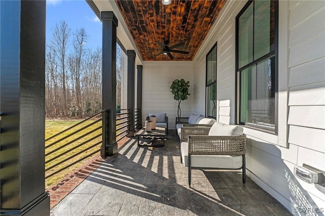 view of patio / terrace featuring ceiling fan and an outdoor hangout area