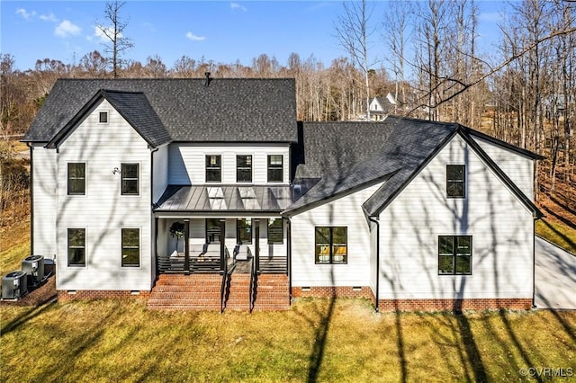 back of property featuring a porch, cooling unit, a yard, crawl space, and roof with shingles