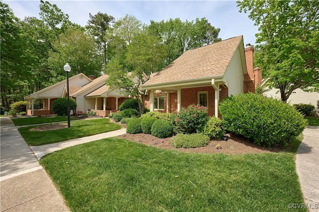 view of front of home with a front yard