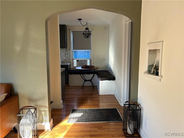 hall featuring cooling unit and dark hardwood / wood-style floors