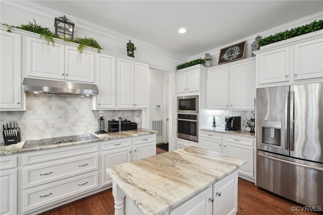 kitchen featuring tasteful backsplash, appliances with stainless steel finishes, light stone countertops, and white cabinets