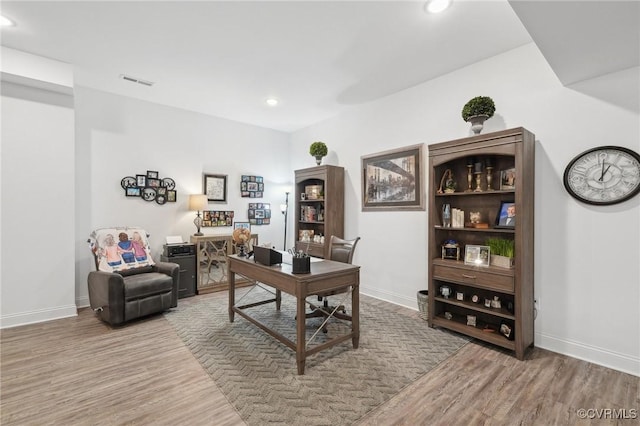 office featuring hardwood / wood-style floors