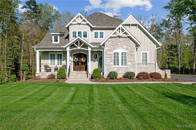 11513 Barrows Ridge Ln, Chesterfield, VA 23838 - craftsman inspired home featuring stone siding, a shingled roof, board and batten siding, and a front yard
