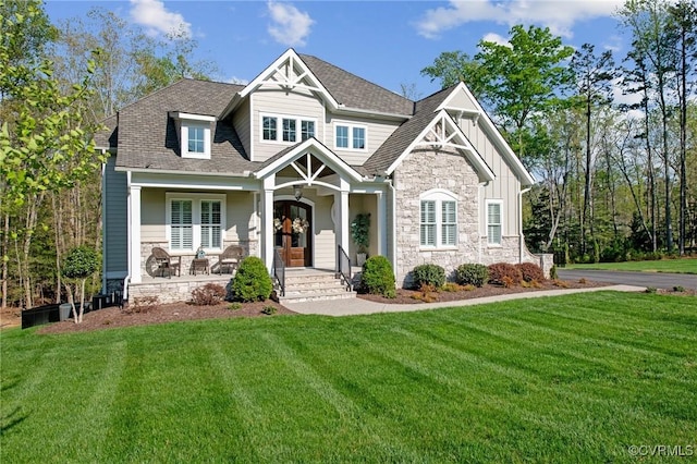 11513 Barrows Ridge Ln, Chesterfield, VA 23838 - craftsman-style home with a front lawn, stone siding, a shingled roof, and covered porch