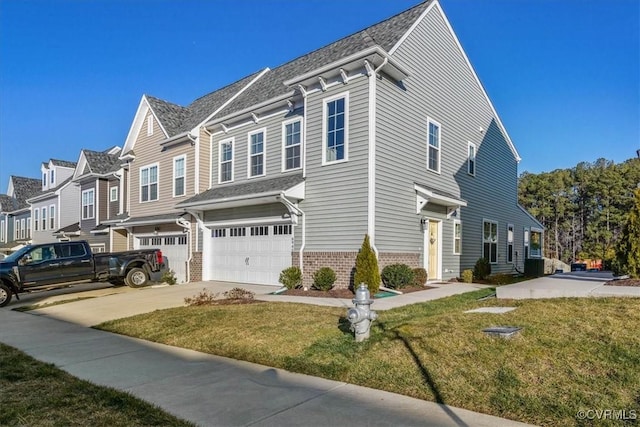 view of front of house with a garage and a front yard