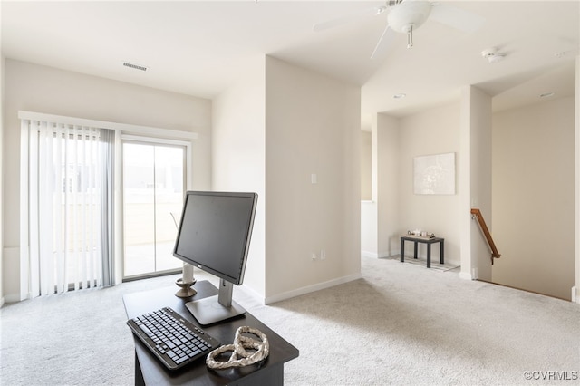 living room with ceiling fan and light carpet