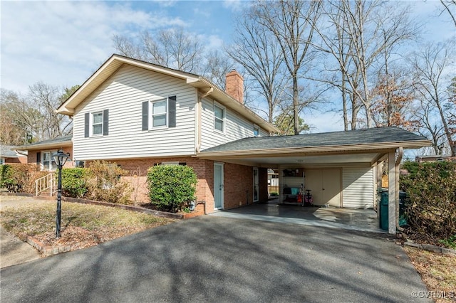 view of side of property featuring a carport