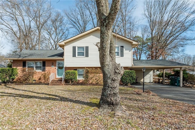 tri-level home featuring a carport