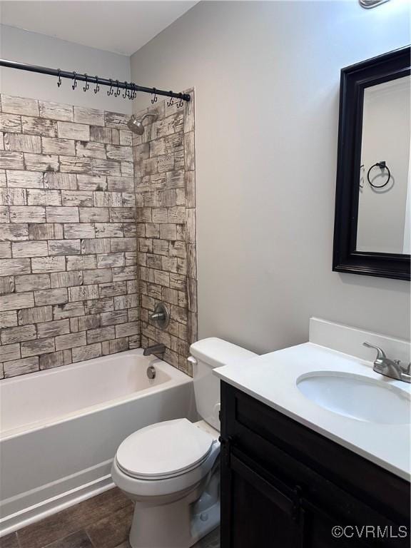 full bathroom featuring vanity, shower / bathtub combination, and toilet