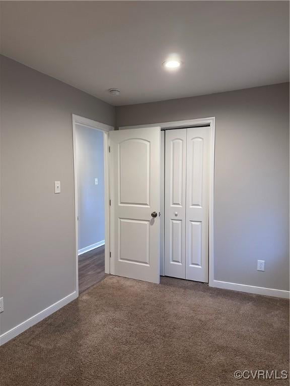 unfurnished bedroom featuring a closet