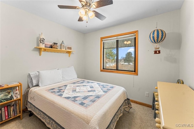 bedroom featuring ceiling fan and carpet floors