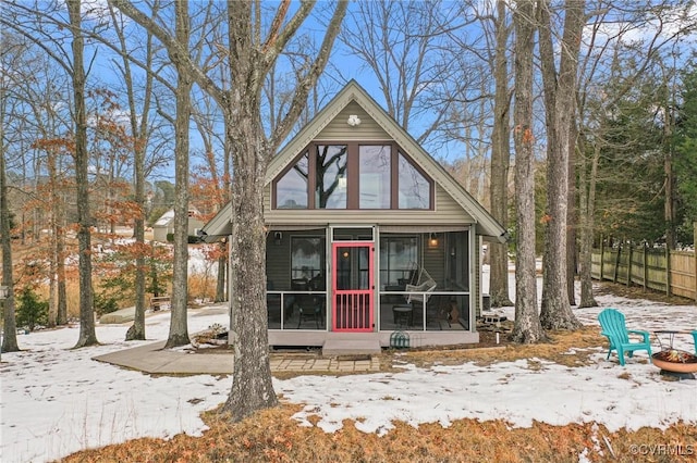 view of front of home featuring a sunroom