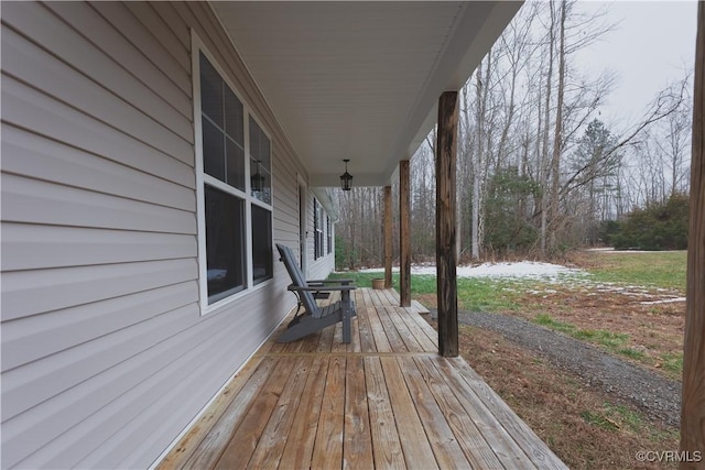 wooden deck featuring covered porch