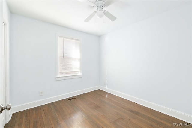 empty room with hardwood / wood-style flooring and ceiling fan