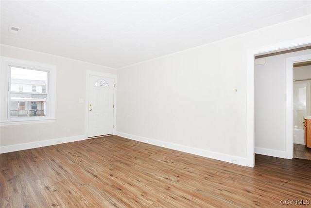 unfurnished room featuring light hardwood / wood-style flooring