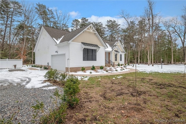 view of property exterior featuring a garage