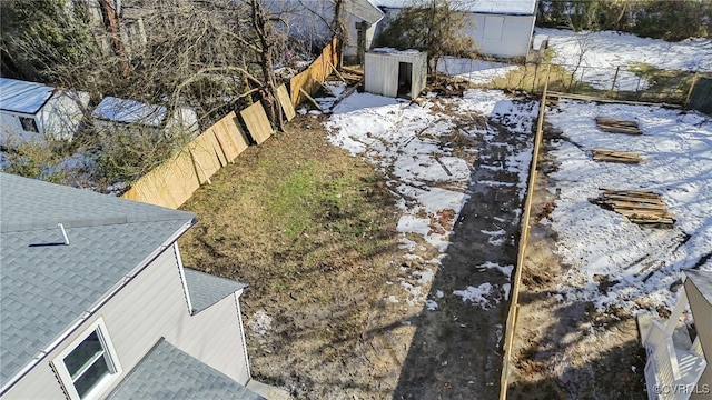 view of yard covered in snow