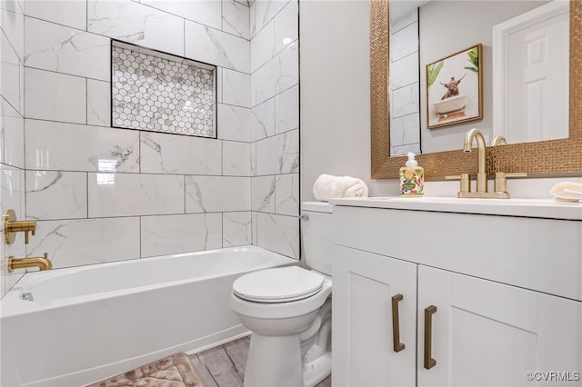 full bathroom featuring toilet, tiled shower / bath combo, vanity, and hardwood / wood-style flooring