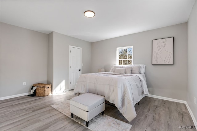 bedroom featuring light wood-type flooring