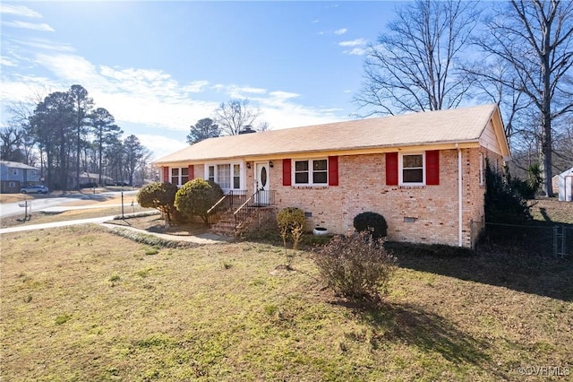 view of front facade with a front yard