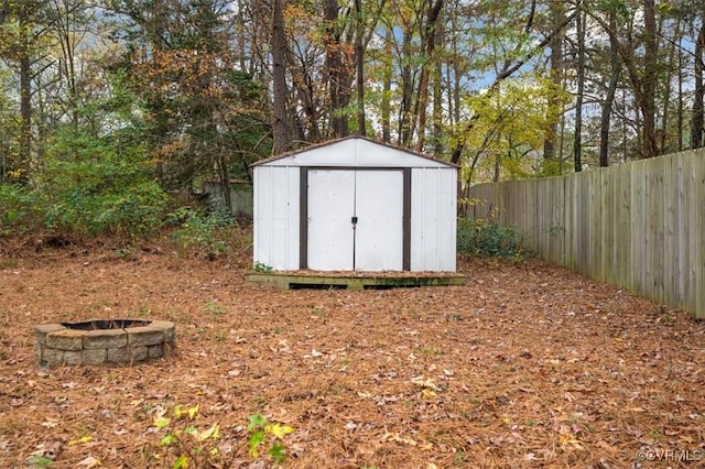 view of outdoor structure with an outdoor fire pit