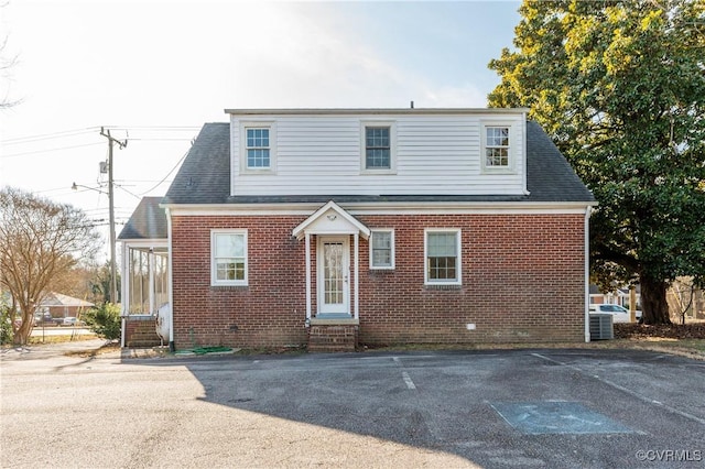 view of front of property featuring central AC unit