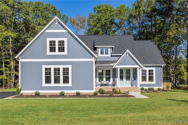 view of front facade with a porch and a front yard