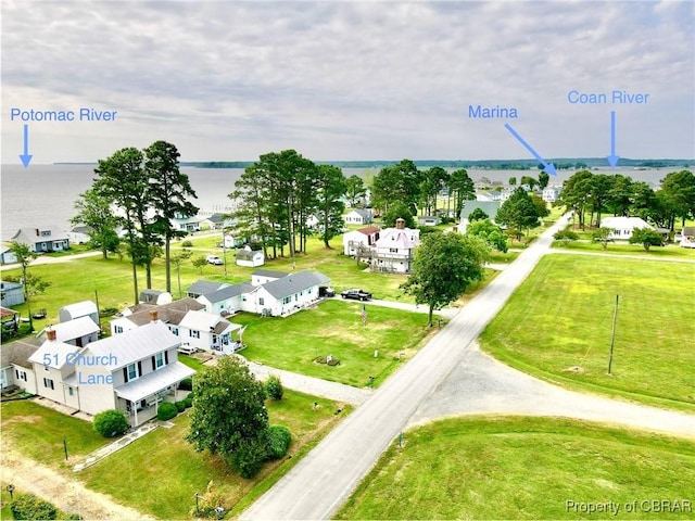 bird's eye view with a water view