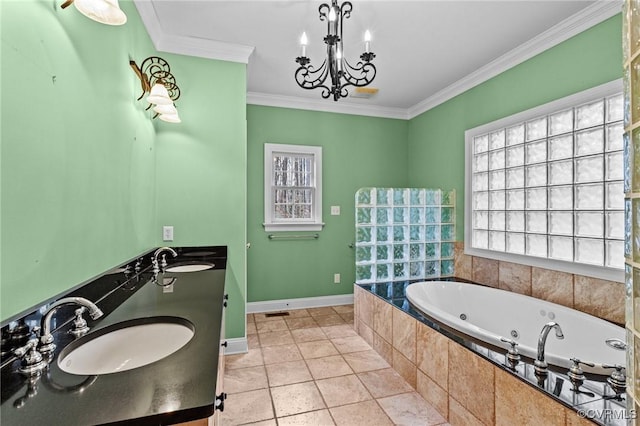 bathroom featuring tiled tub, a notable chandelier, tile patterned floors, crown molding, and vanity