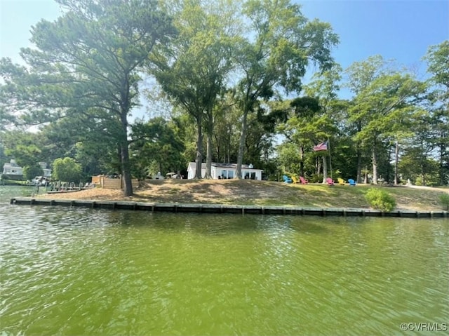 view of dock with a water view