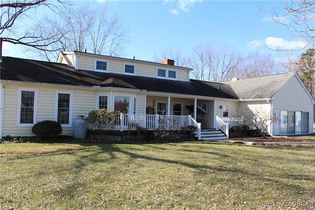 view of front of home featuring a front lawn and covered porch