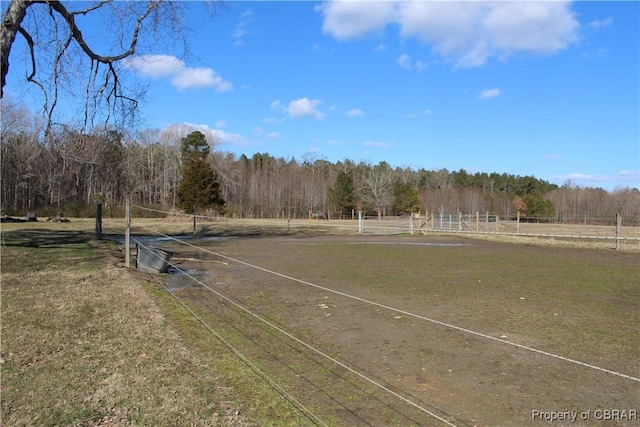 view of yard with a rural view