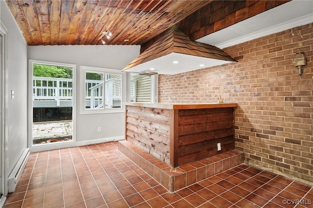 interior space featuring vaulted ceiling and a baseboard radiator