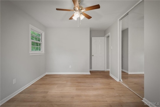 spare room featuring ceiling fan and light hardwood / wood-style flooring