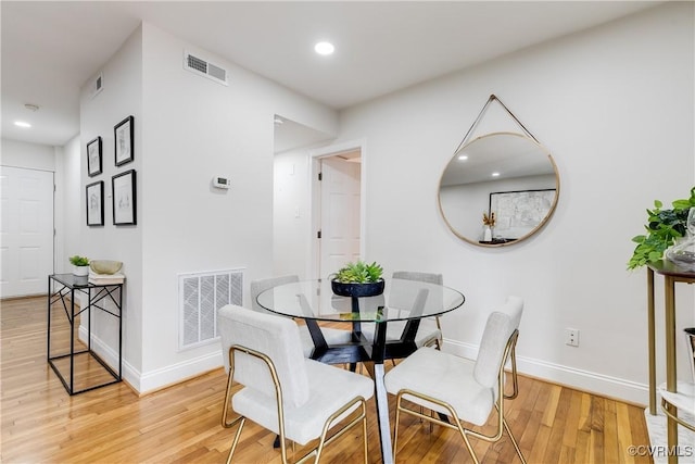 dining room featuring light wood-type flooring