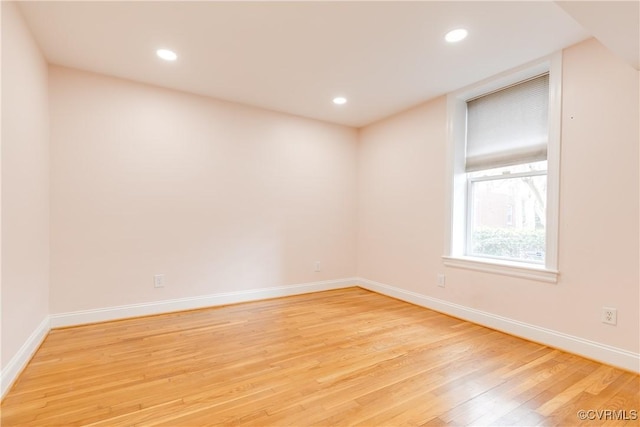 unfurnished room featuring light hardwood / wood-style floors