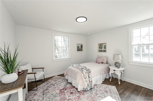 bedroom featuring dark hardwood / wood-style floors