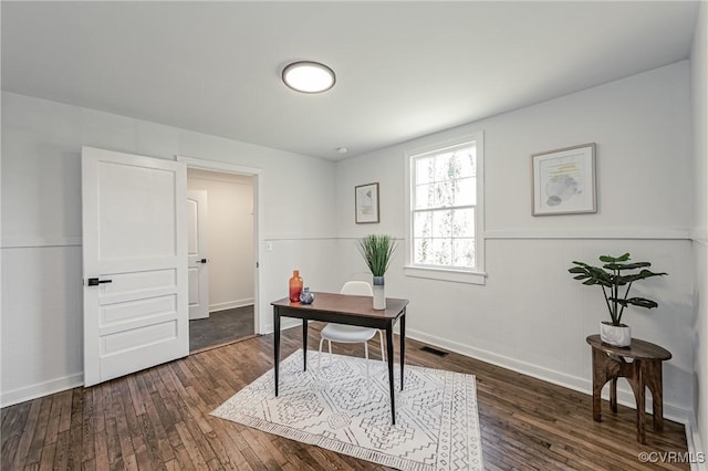 home office featuring dark hardwood / wood-style flooring