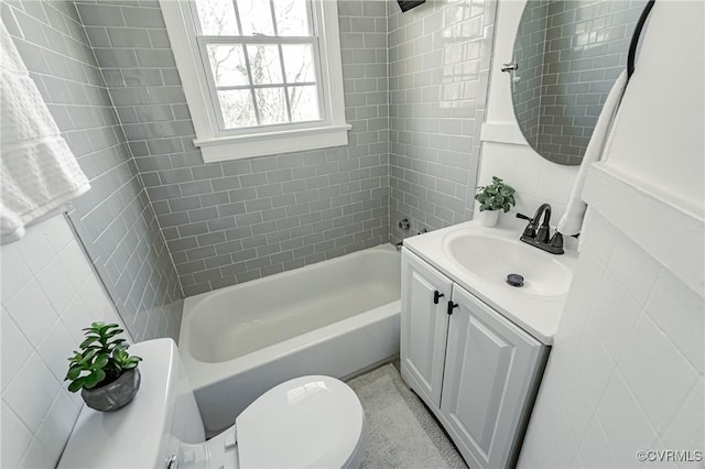 full bathroom with toilet, vanity, and bathtub / shower combination