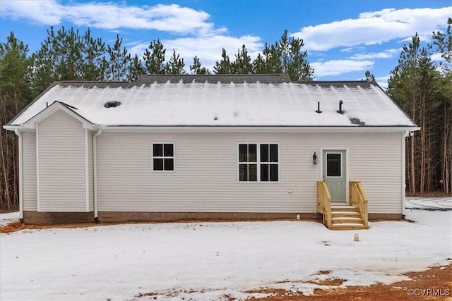 view of snow covered property