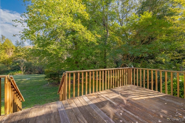 deck featuring a lawn