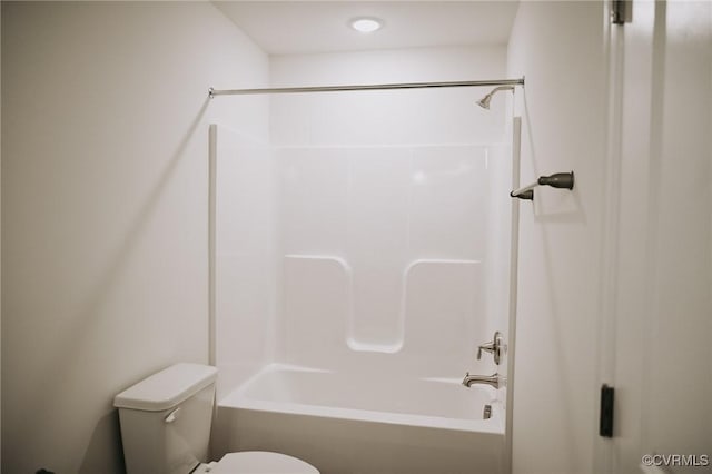 bathroom with toilet and shower / washtub combination